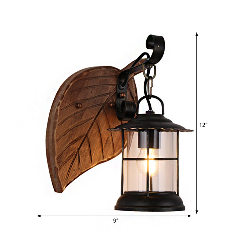 Antiqued Kerosene Wall Sconce With Clear Glass And Wood Leaf/Key Backplate For Dining Room Lighting