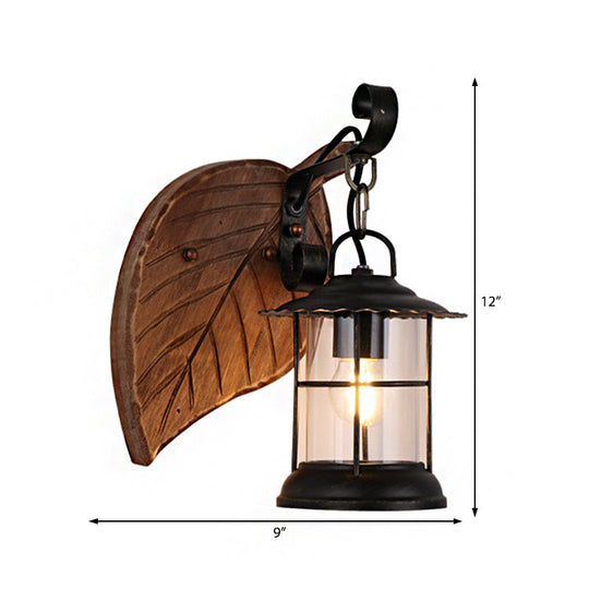 Antiqued Kerosene Wall Sconce With Clear Glass And Wood Leaf/Key Backplate For Dining Room Lighting