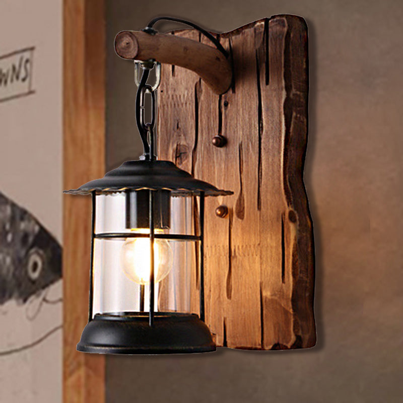 Antiqued Kerosene Wall Sconce With Clear Glass And Wood Leaf/Key Backplate For Dining Room Lighting