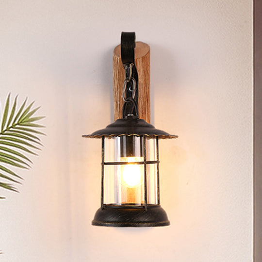 Antiqued Kerosene Wall Sconce With Clear Glass And Wood Leaf/Key Backplate For Dining Room Lighting