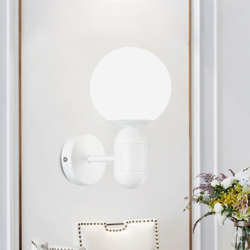 Modern White Wall Lamp With Globe Shade Capsule Body - Metal & Glass Light For Meeting Room