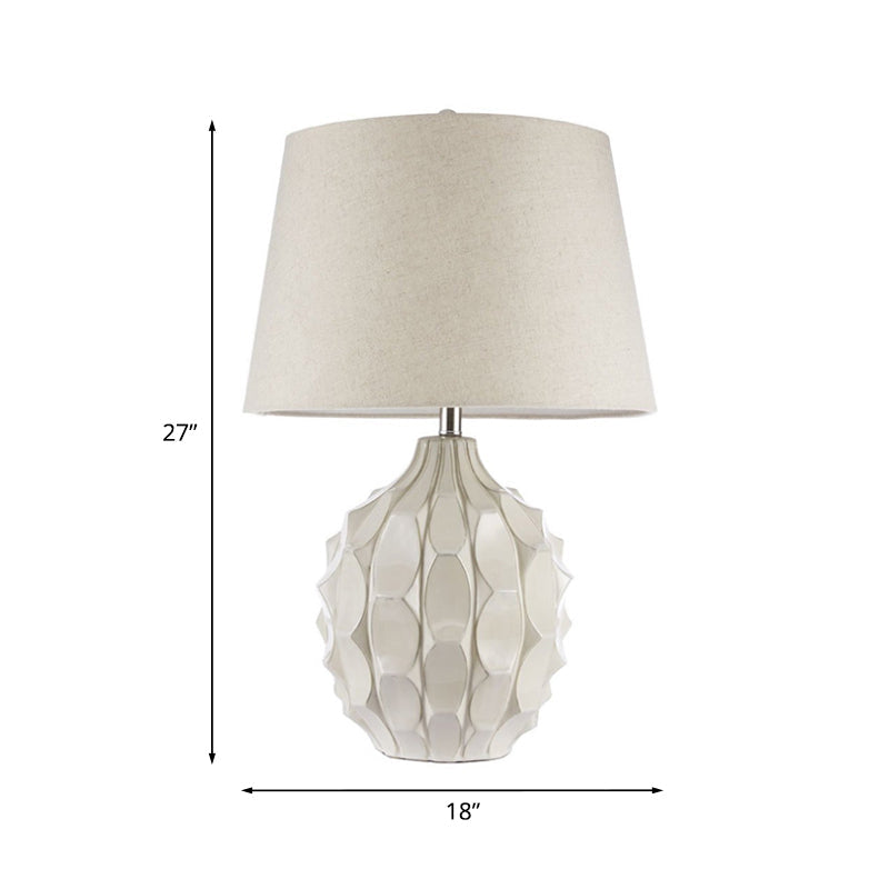 Rustic Pinecone Ceramic Nightstand Lamp With Tapered Drum Shade - White