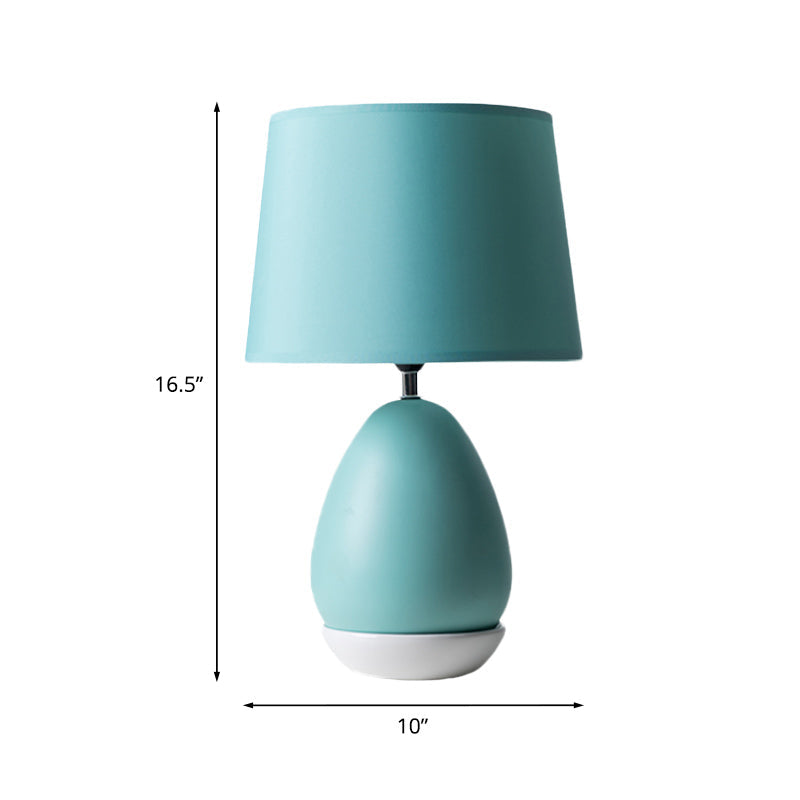 Modern Ceramic Egg-Shaped Bedside Night Light With Blue Drum Fabric Shade