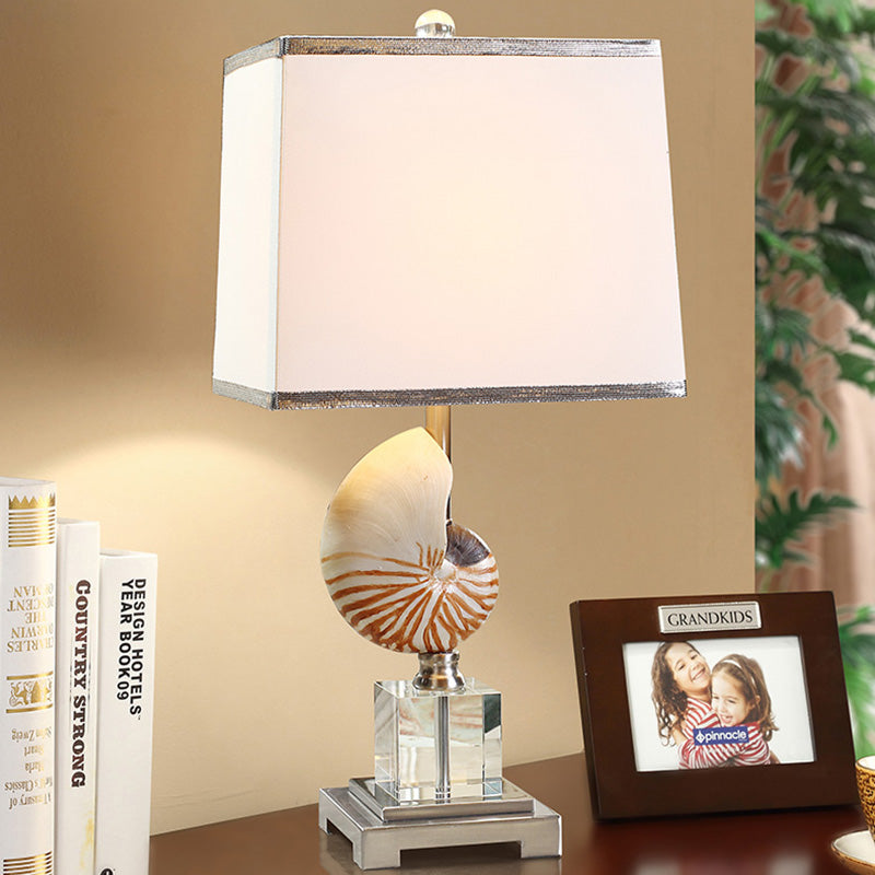 White Fabric Cuboid Nightstand Lamp With Decorative Nautilus Shell Accent - 1 Head Night Table Light