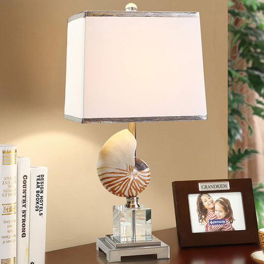 White Fabric Cuboid Nightstand Lamp With Decorative Nautilus Shell Accent - 1 Head Night Table Light