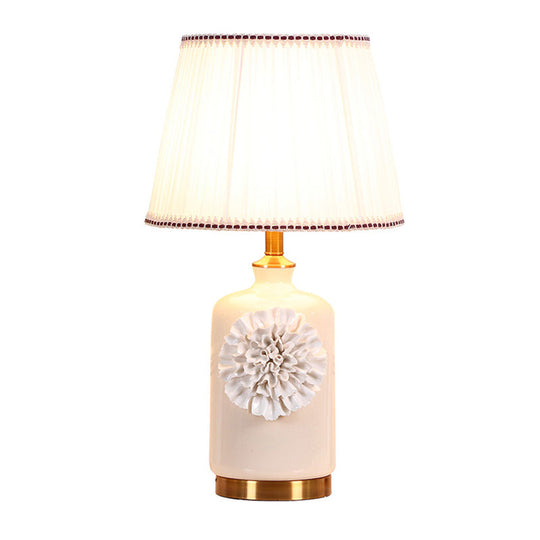 Modern White Truncated Cone Table Lamp With Pleated Fabric Shade And Flower Decor