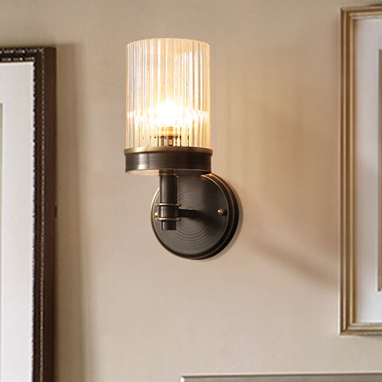 Antiqued Black Glass Wall Sconce Light Fixture With Clear Cylindrical Shade - Ideal For Bedroom