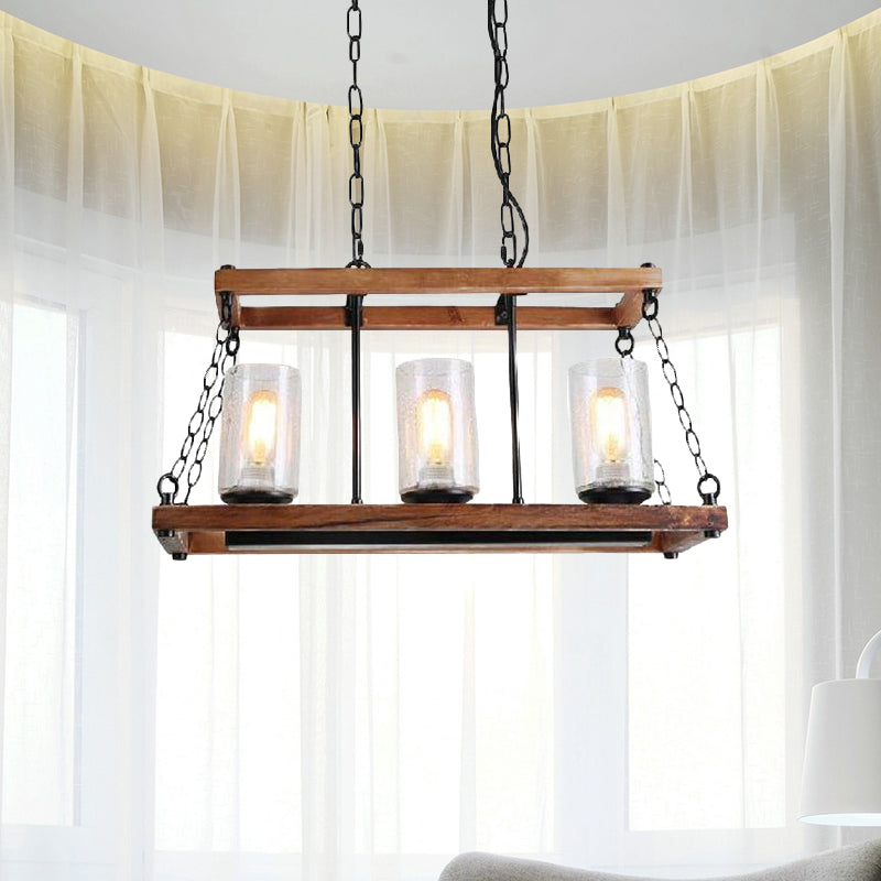 Rustic Brown Seeded Glass Island Light With 3-Bulb Cylinder Design And Wooden Trapezoid Guard For