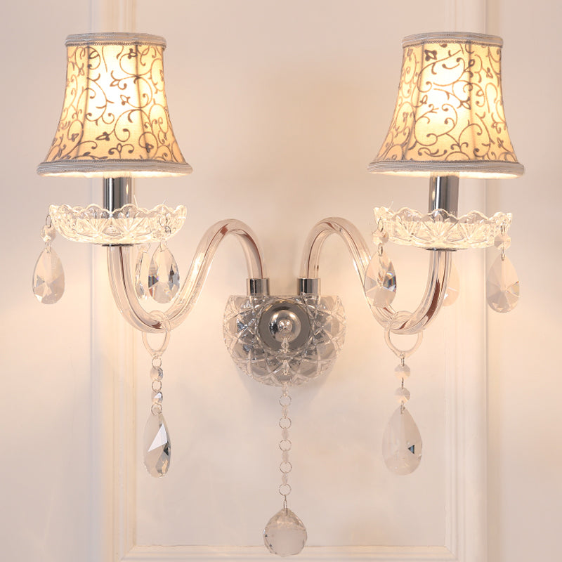 Traditional 2-Headed Wall Sconce With Bell Shade Flower-Patterned Fabric & Crystal Droplets For