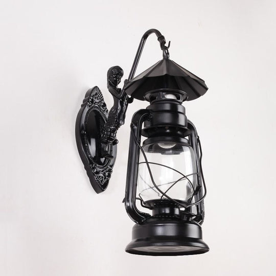 Coastal Single Bulb Kerosene Glass Wall Sconce In Black/Antique Brass For Living Room