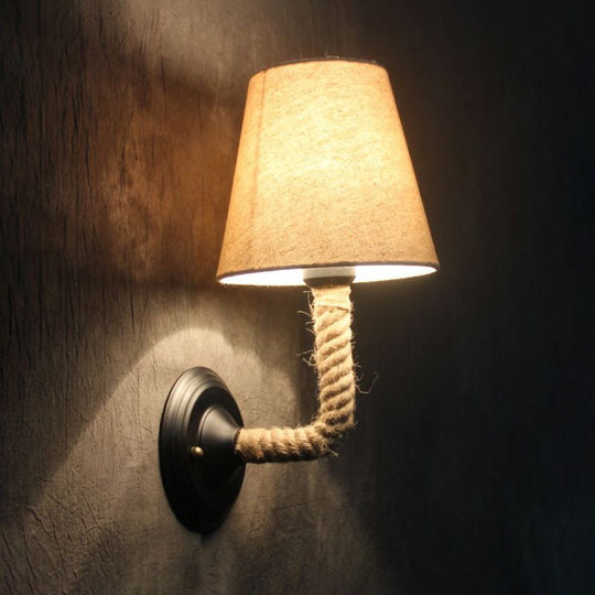 Lodge Style Beige Fabric Wall Sconce With Curved/Angle Arm For Restaurants - 1 Light