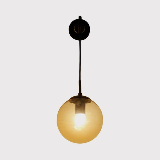 Industrial Amber Glass Wall Lamp - 1 Light Globe Sconce Fixture In Black/Brass For Living Room