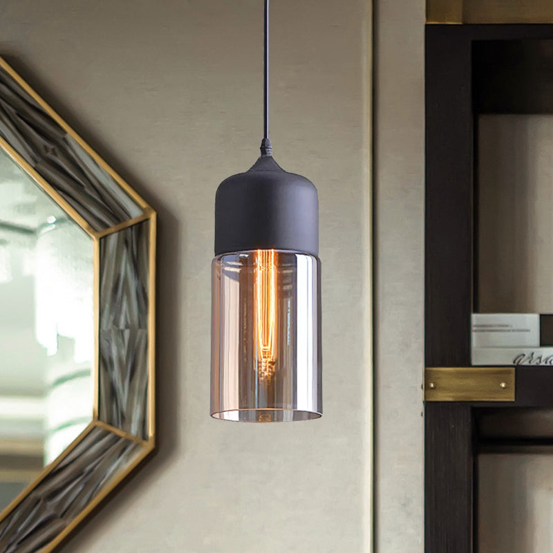 Industrial Cylinder Pendant Light with Brown Glass Shade - 1-Light Hanging Ceiling Fixture in Black, 5"/7"/8" Wide