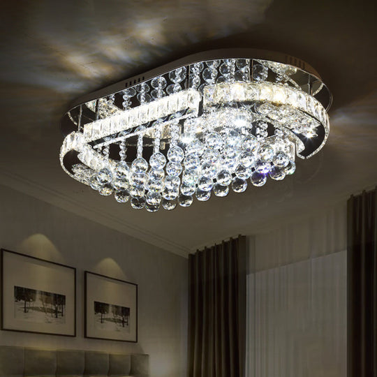 Sleek Stainless-Steel LED Light Fixture with Clear Cut Crystal Blocks and Oval Semi Flush Design