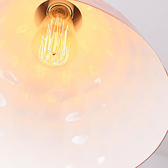 Rose Gold Industrial Pendant Light with Dimpled Conic Metal Design and Hanging Cord