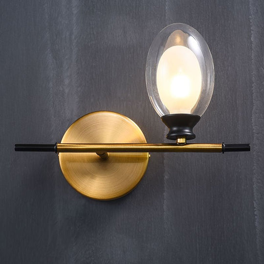 Vintage Oval Wall Sconce With 1 Clear Glass Light - Bedroom Mounted Lamp Featuring Brass Bar