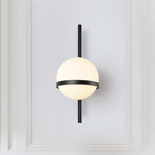 Modern Black/Gold Vertical Wall Sconce With Orbit Opal Glass Shade - 1 Head Metal Lamp 6/8 Width