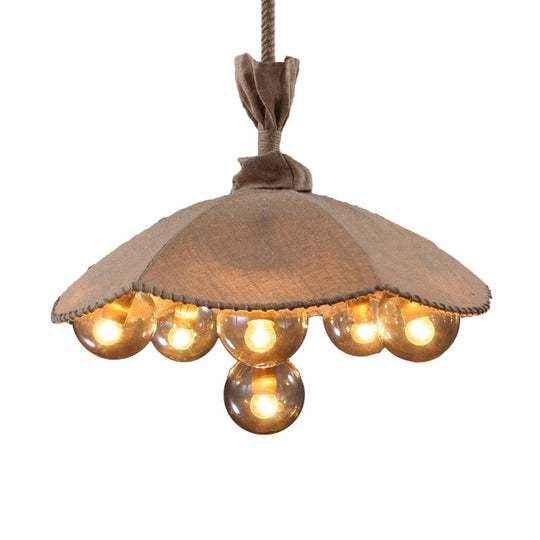 Beige Scalloped Pendant Light: Lodge Chandelier with 6 Fabric Heads & Glass Ball Shade