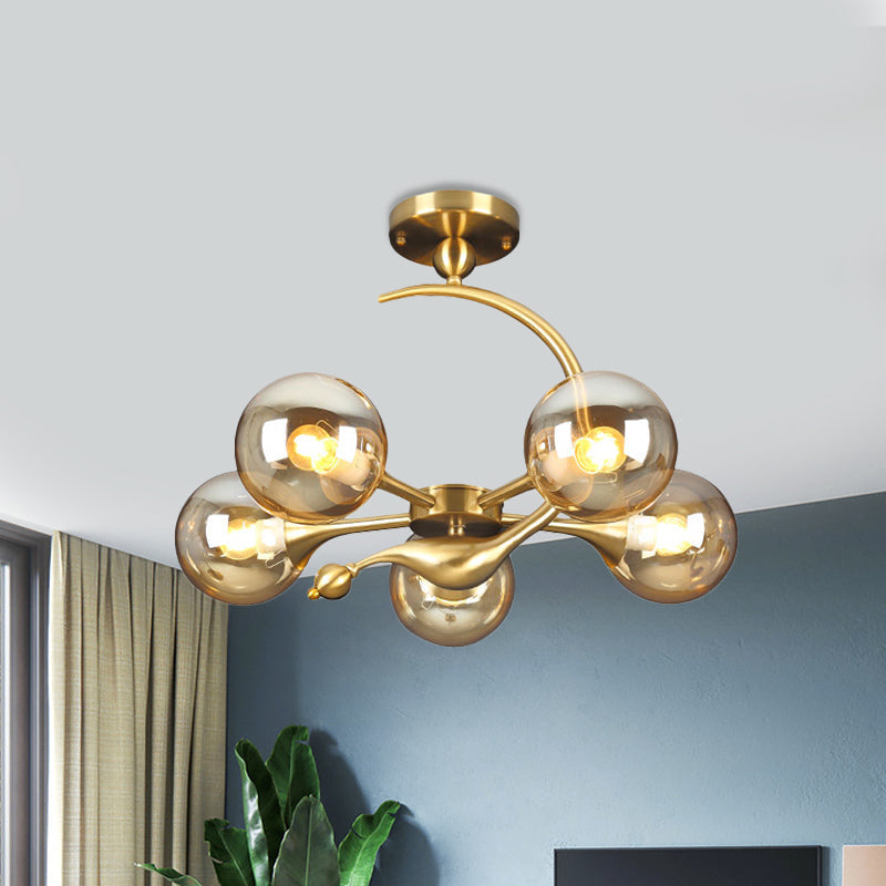 Burst Amber Glass Orb Semi Flush Chandelier - Postmodern 3/5 Heads Brass Ceiling Mounted Light with Curved Arm