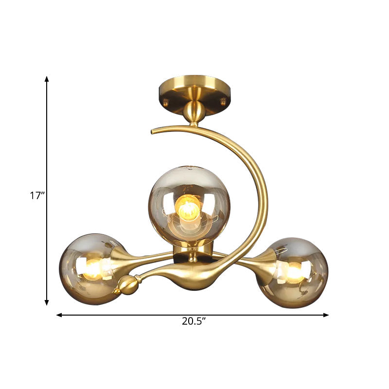 Burst Amber Glass Orb Semi Flush Chandelier - Postmodern 3/5 Heads Brass Ceiling Mounted Light with Curved Arm