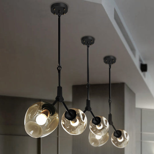 Modernist Black/Gold Bifurcated Chandelier With Open Dimpled Glass Suspension Pendant - 2 Lights