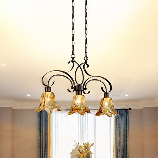 Traditional Black Island Lamp With Amber Glass Floral Design And 3 Down Lighting Pendants For Dining