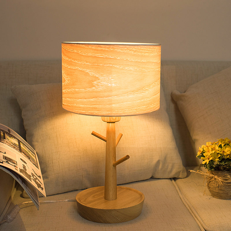 Modern 1-Light Beige Table Lamp With Wood Drum Shade And Hook Design - Functional Night Lighting