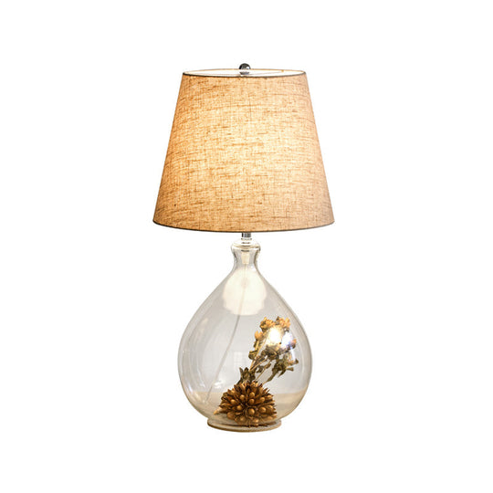 Contemporary Clear Waterdrop Glass Table Lamp With Floral Decor And Fabric Shade