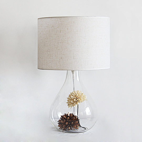 Pastoral Fabric 1-Light Table Lamp With White Drum Shade Vase Clear Glass Base & Dried Flower Accent