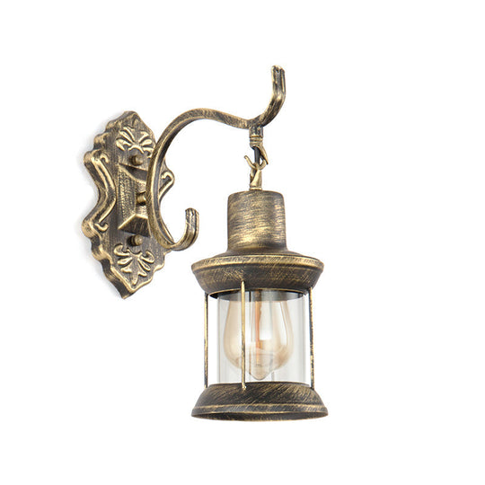 Rustic Wall Mounted Kerosene Light Fixture With Carved Pattern - Aged Bronze Finish Clear Glass