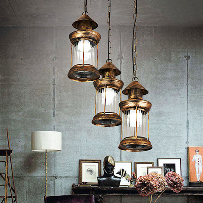 Coastal Kerosene 3-Head Pendant Lamp In Brass With Clear Ribbed Glass Shade