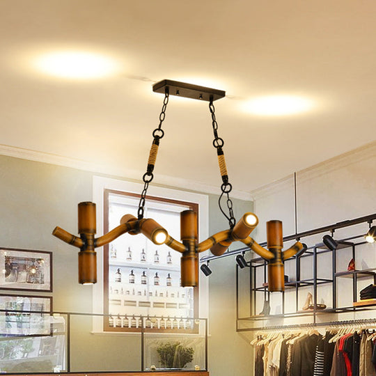 10-Light Metal Island Pendant In Brown With Wave Style Pipe Shade And Rope Detail.