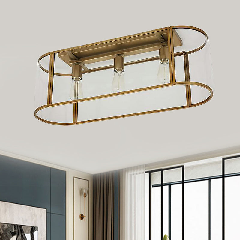 3-Head Flush Mount Light: Metal Warehouse Corridor Lighting with Oval Clear Glass Shade in Black/Gold