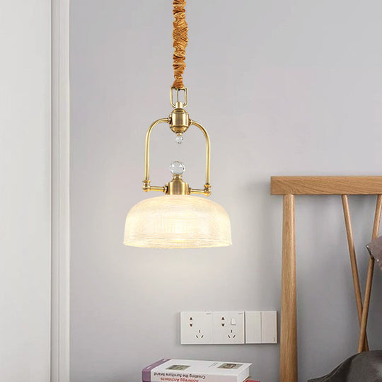 Golden Traditional Pendant Light With Clear Prismatic Glass Shade And Metal Suspension