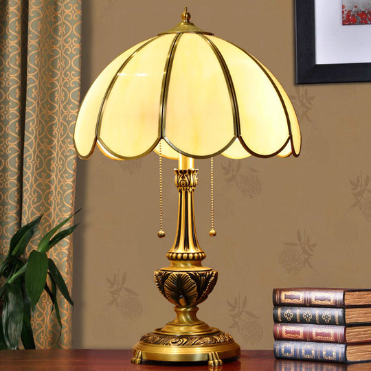 Colonialist Beige Glass 1-Bulb Nightstand Lamp - Gold Scalloped Metal Table Light With Pull Chain