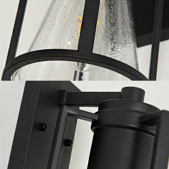 Industrial Black Sconce With Seeded Glass And Metal Cage