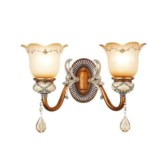 Lodge Style Flower Wall Lamp With Frosted Glass Teardrop Crystal Deco And Metal Arm In Gold -