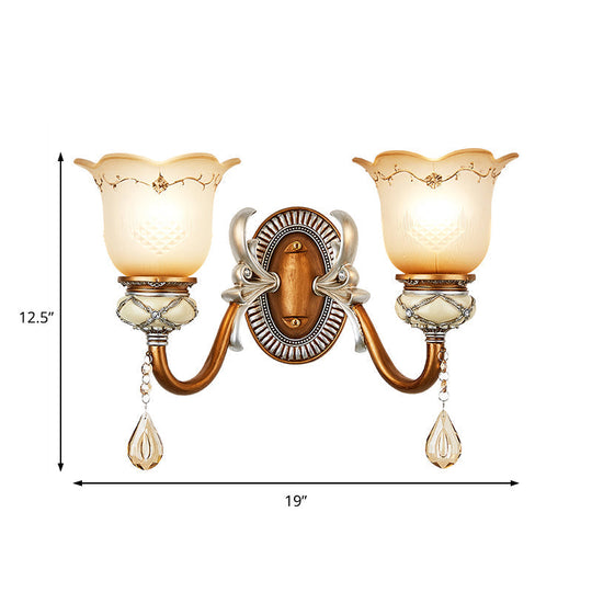 Lodge Style Flower Wall Lamp With Frosted Glass Teardrop Crystal Deco And Metal Arm In Gold -