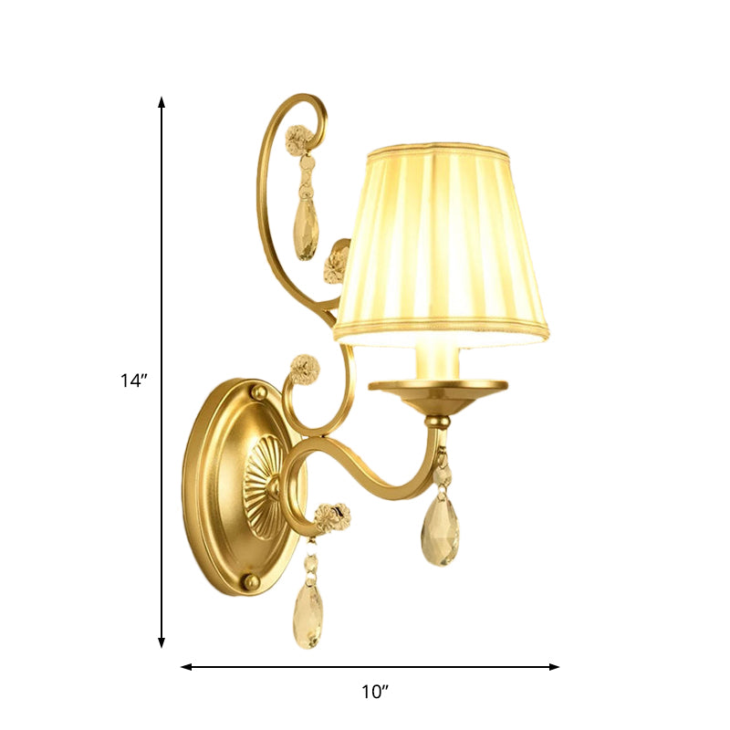 Contemporary Crystal Wall Sconce With Curved Arm And Brass Finish