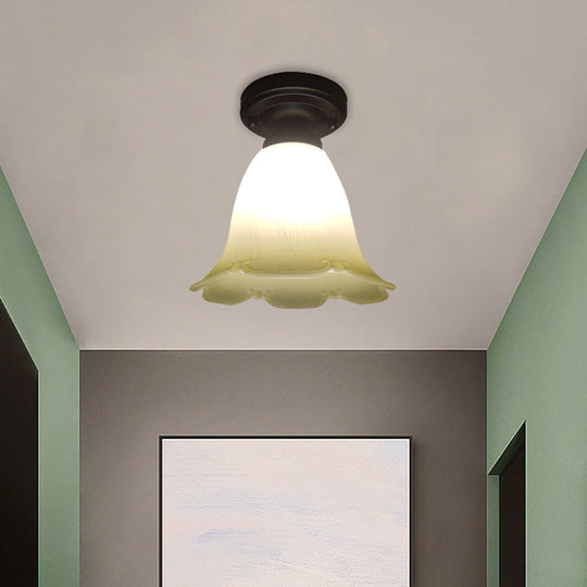 White Glass Flush Mount Ceiling Light with Black Base and Cottage Flower Design