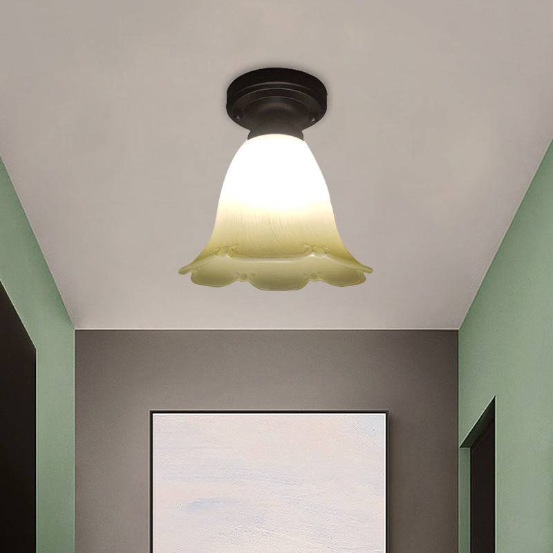 White Glass Flush Mount Ceiling Light With Black Base And Cottage Flower Design