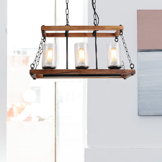 Rustic Brown Seeded Glass Island Light With 3-Bulb Cylinder Design And Wooden Trapezoid Guard For