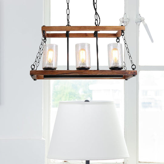 Rustic Brown Seeded Glass Island Light With 3-Bulb Cylinder Design And Wooden Trapezoid Guard For