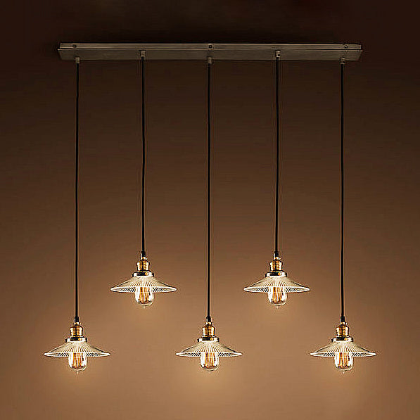 Antique Style Aged Brass Cone Pendant Light With Ribbed Clear Glass - 5 Lights Linear Canopy