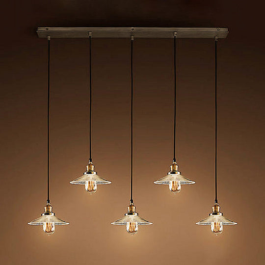 Antique Style Aged Brass Cone Pendant Light With Ribbed Clear Glass - 5 Lights Linear Canopy