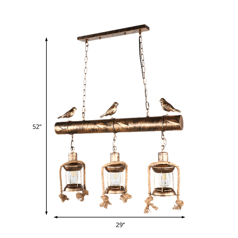 Antique Brass Lantern Pendant With Clear Glass And Bird Accent - 3-Light Coastal Island Kit