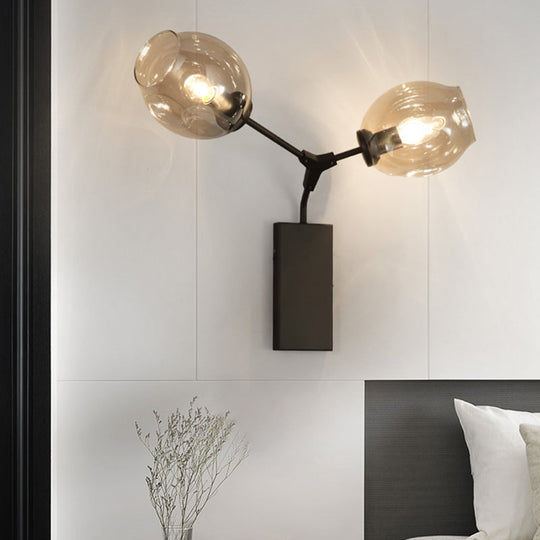 Contemporary Black/Gold Wall Sconce With Oval Amber/Gold/Clear Glass Shade - Elegant Half-Light