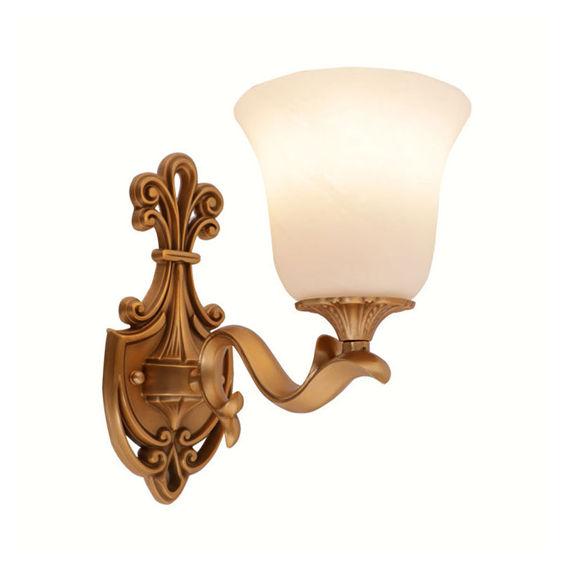 Countryside Opal Glass Wall Sconce With Brass Finish And Curvy Arm