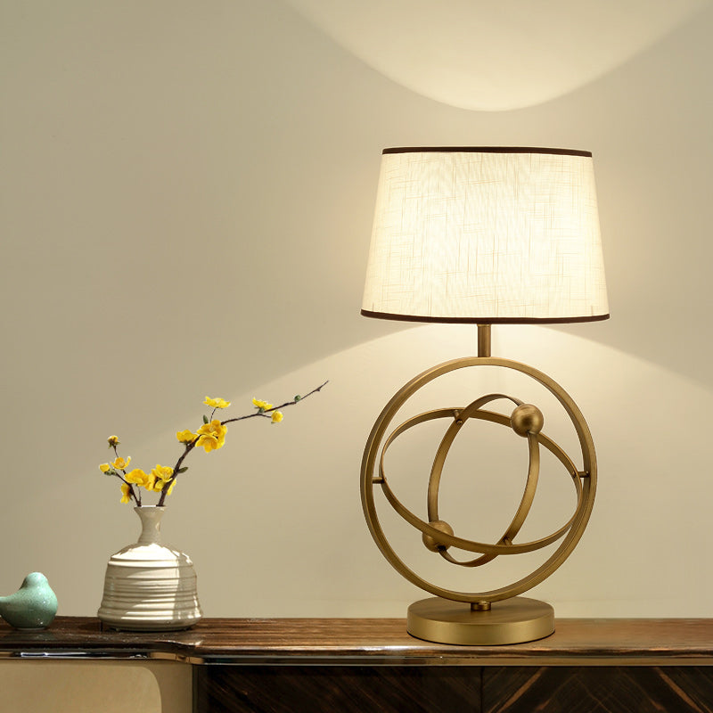 Conic Night Lamp With White/Green Traditional Fabric Shade And Orbit/Lotus Seedpod Base