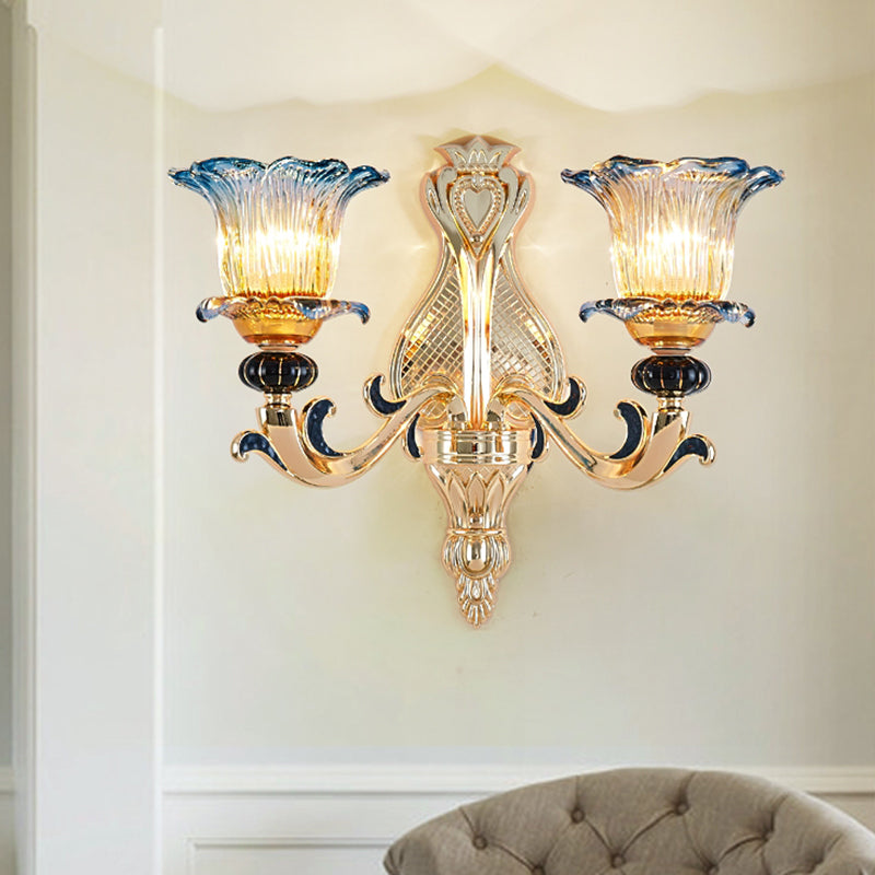 Antiqued Gold Flower Wall Sconce With Clear Ruffle Glass Bulbs - Curved Arm Mounted Lamp Light